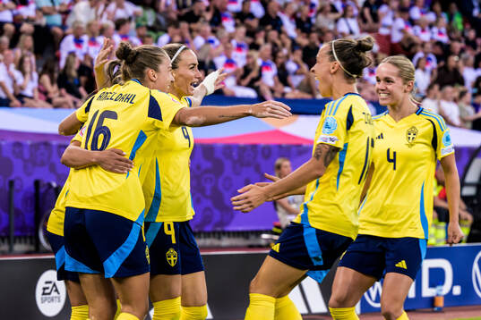 Kosovare Asllani of Sweden celebrate with teammates