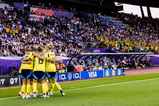 Kosovare Asllani of Sweden celebrate with teammates