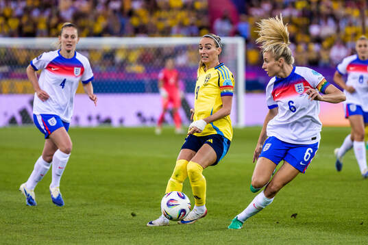 Kosovare Asllani of Sweden and Leah Williamson of England