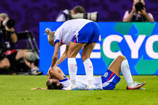 Lauren Hemp of England in pain