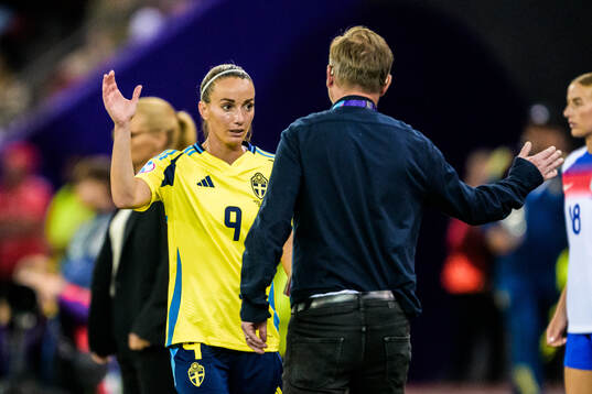 Kosovare Asllani and Head coach Peter Gerhardsson of Sweden