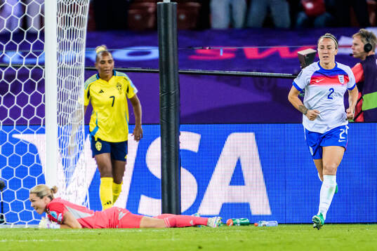 goalkeeper Jennifer Falk of Sweden and Lucy Bronze of