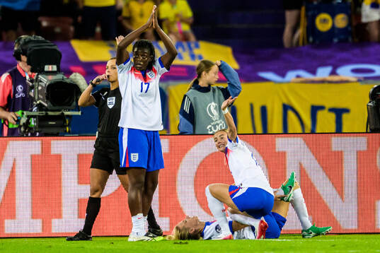 Chloe Kelly of England in pain