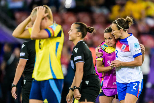 Johanna Rytting Kaneryd of Sweden and Lucy Bronze of England