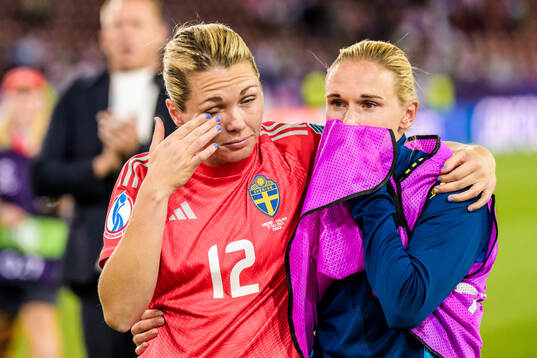 Goalkeeper Jennifer Falk and Jonna Andersson of Sweden
