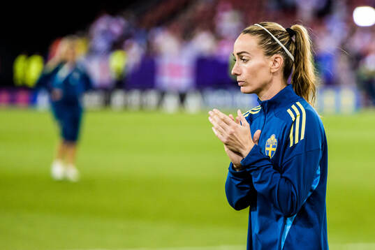 Kosovare Asllani of Sweden looks dejected