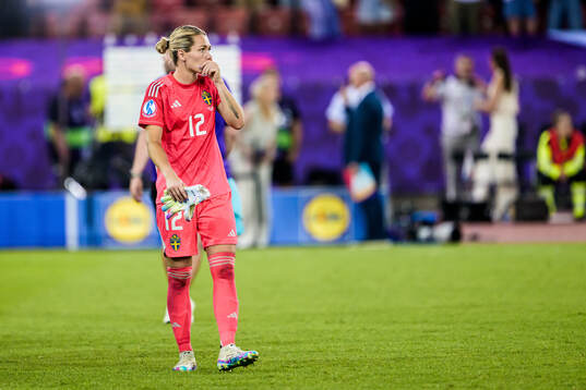 Goalkeeper Jennifer Falk of Sweden looks dejected