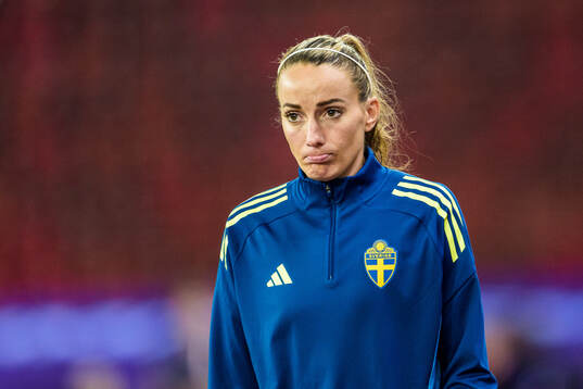 Kosovare Asllani of Sweden looks dejected