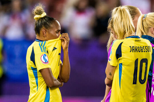 Madelen Janogy of Sweden looks dejected