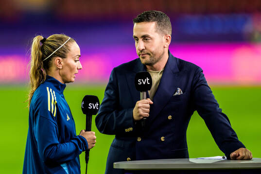 Kosovare Asllani and Johan Kücükaslan of Swedish