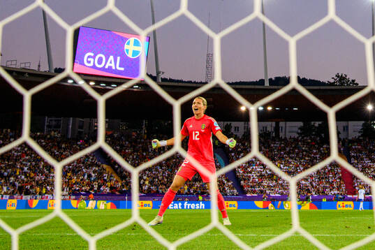Goalkeeper Jennifer Falk of Sweden celebrates