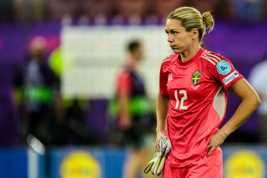 Goalkeeper Jennifer Falk of Sweden looks dejected
