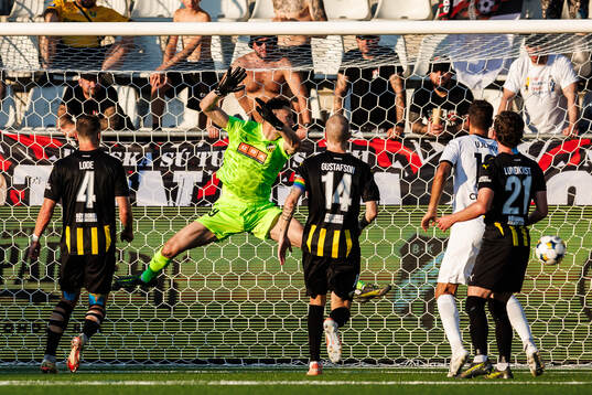 Roman Prochazka of Spartak Trnava (not in picture) scores