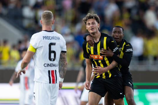 Roman Prochazka of Spartak Trnava and Silas Andersen and