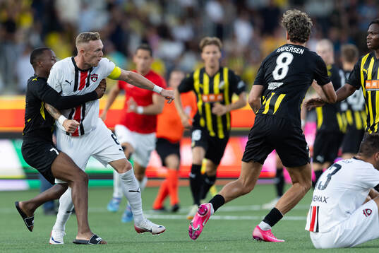 Roman Prochazka of Spartak Trnava and Silas Andersen and