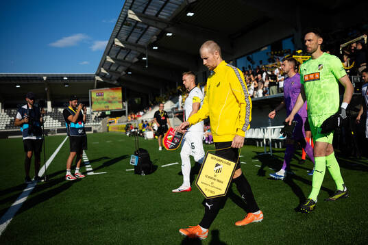 Simon Gustafson and goalkeeper Etrit Berisha of Häcken