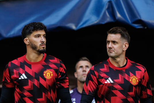 Altay Bayindir and Tom Heaton of Manchester United