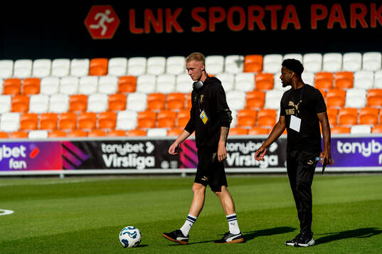 Daniel Gudjohnsen and Emmanuel Ekong of Malmö FF