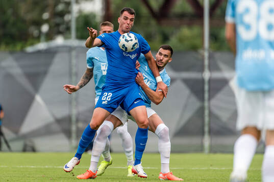 Darko Lemajic of FK RFS and Andrej Djuric of Malmö FF