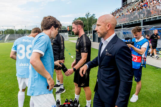Oliver Berg and head coach Henrik Rydström  of Malmö FF