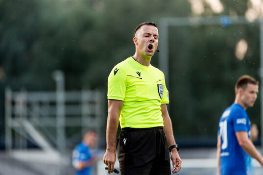 Referee Milos Milanovic