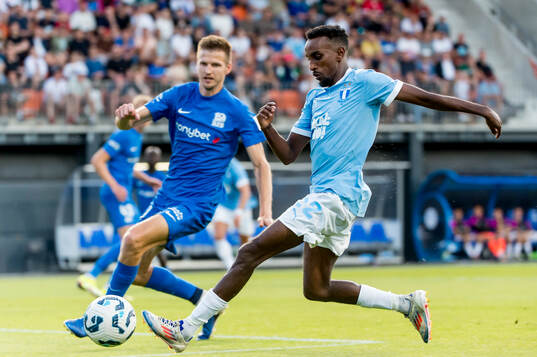 Taha Ali of Malmö FF and Elvis Stuglis of FK RFS