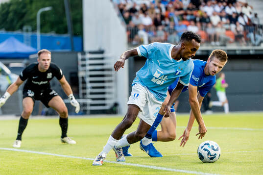 Taha Ali of Malmö FF and Elvis Stuglis of FK RFS