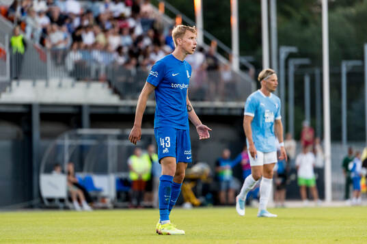 Ziga Lipuscek of FK RFS looks dejected