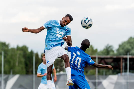 Taha Ali of Malmö FF and Mor Talla of FK RFS