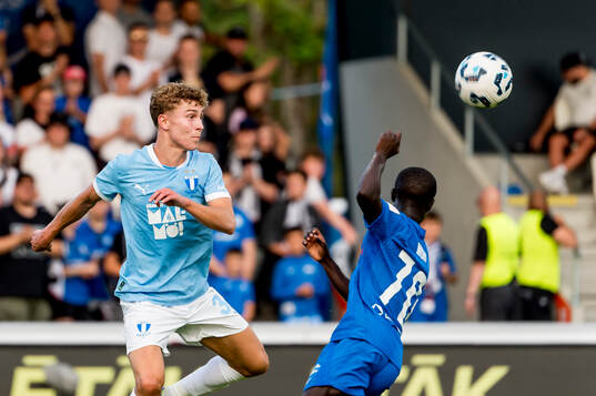Hugo Bolin of Malmö FF and Mor Talla of FK RFS
