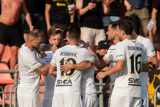 Players of AIK celebrate with Bersant Celina
