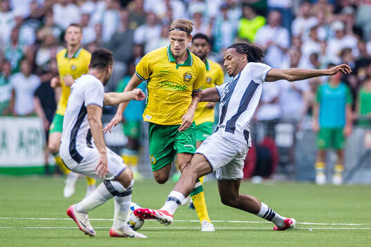 Markus Karlsson of Hammarby and Etienne Camara of Royal