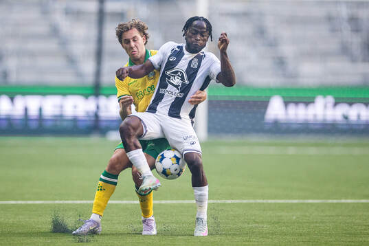 Hampus Skoglund of Hammarby and Guiagon Parfait of Royal