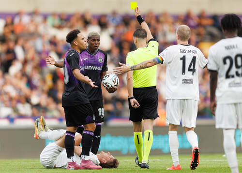 Nilson Angulo of Anderlecht receives a yellow card