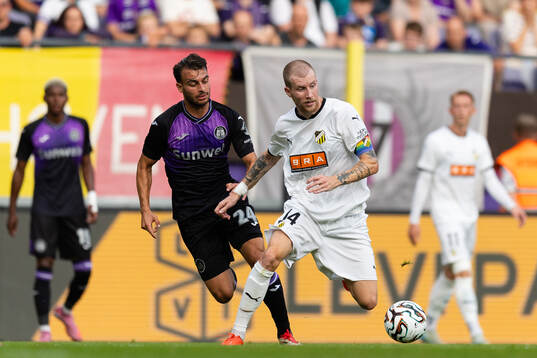 Enric Llansana of Anderlecht and Simon Gustafson of Häcken