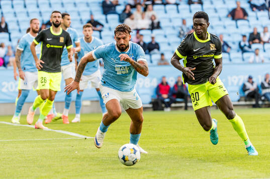 Sead Haksabanovic of Malmö FF and Rasid Njie of FK RFS