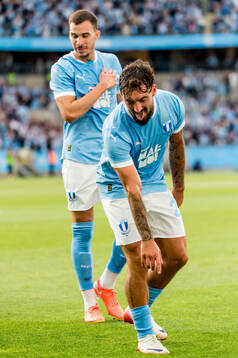 Andrej Djuric and Sead Haksabanovic of Malmö FF celebrate