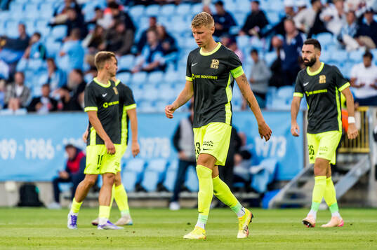 Ziga Lipuscek of FK RFS looks dejected