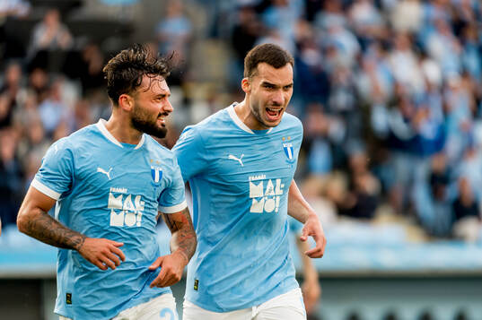 Sead Haksabanovic and Andrej Djuric of Malmö FF celebrates