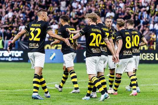 Erik Hovden Flataker of AIK celebrate with team mates