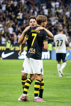 Anton Salétros of AIK celebrates with Charlie Pavey