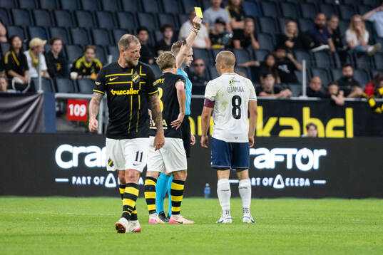 Henrik Ojamaa of Paide Linnameeskond is shown a yellow card