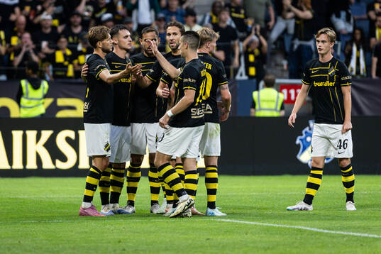 Anton Salétros of AIK celebrates with teammates