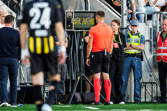 Referee Patrik Kolaric checks the VAR-screen