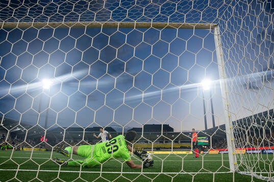 Goalkeeper Etrit Berisha of Häcken saves a penalty
