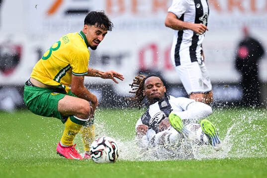 Sebastian Tounekti of Hammarby and Dabbagh Oday of Sporting
