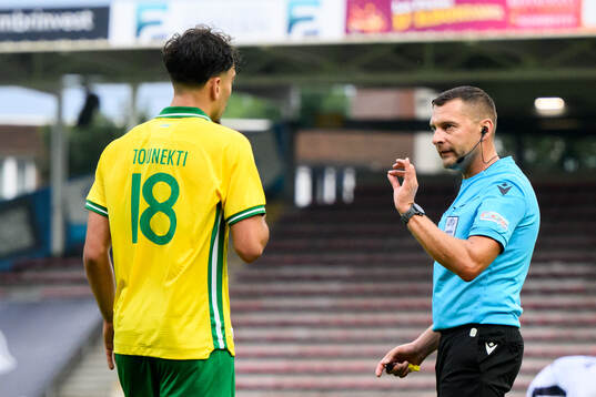 Sebastian Tounekti of Hammarby and referee Vitālijs