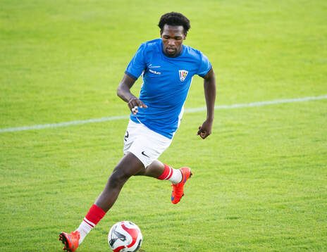 Balkans Abraham Kyagulanyi i matchen i division 2 mellan