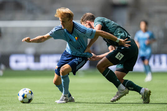 Djurgårdens Oskar Fallenius och Halmstads Joel Allansson
