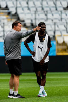 Sports director Daniel Andersson and Salifou Soumah